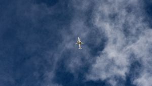 Preview wallpaper airplane, sky, flight, clouds, bottom view