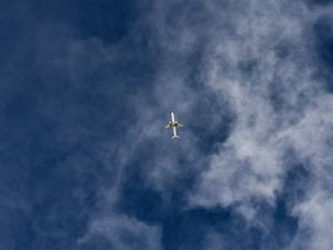 Preview wallpaper airplane, sky, flight, clouds, bottom view