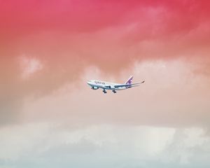 Preview wallpaper airplane, sky, flight, gradient, colorful, clouds