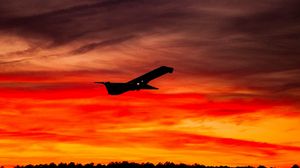 Preview wallpaper airplane, sunset, sky, flight