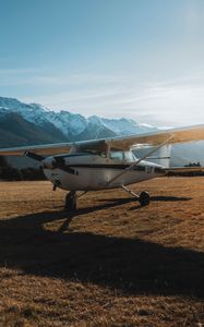 Preview wallpaper airplane, transport, metal, mountains, snowy