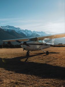 Preview wallpaper airplane, transport, metal, mountains, snowy