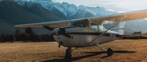 Preview wallpaper airplane, transport, metal, mountains, snowy