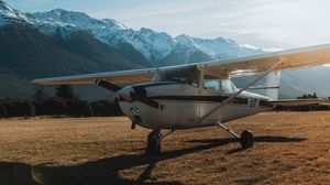 Preview wallpaper airplane, transport, metal, mountains, snowy