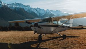 Preview wallpaper airplane, transport, metal, mountains, snowy