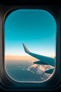 Preview wallpaper airplane, window, porthole, wing, clouds, view