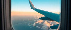 Preview wallpaper airplane, window, porthole, wing, clouds, view