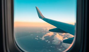 Preview wallpaper airplane, window, porthole, wing, clouds, view