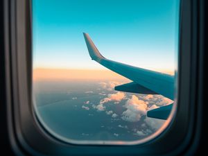 Preview wallpaper airplane, window, porthole, wing, clouds, view