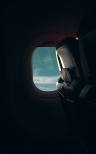 Preview wallpaper airplane, window, porthole, dark