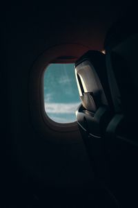 Preview wallpaper airplane, window, porthole, dark