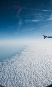 Preview wallpaper airplane, wing, clouds, sky, view