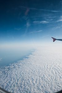 Preview wallpaper airplane, wing, clouds, sky, view