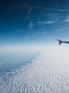 Preview wallpaper airplane, wing, clouds, sky, view
