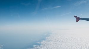 Preview wallpaper airplane, wing, clouds, sky, view