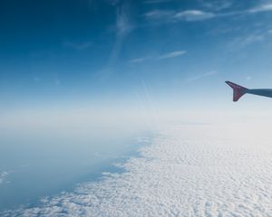 Preview wallpaper airplane, wing, clouds, sky, view