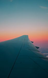 Preview wallpaper airplane wing, plane, sky, flight, clouds