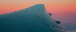 Preview wallpaper airplane wing, plane, sky, flight, clouds