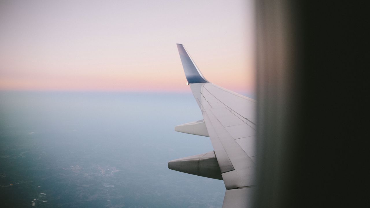 Wallpaper airplane wing, porthole, sky