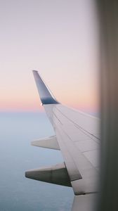 Preview wallpaper airplane wing, porthole, sky