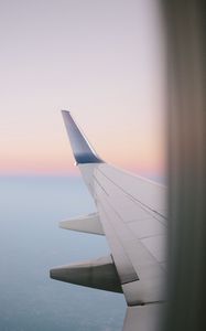 Preview wallpaper airplane wing, porthole, sky