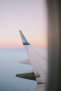 Preview wallpaper airplane wing, porthole, sky