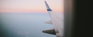 Preview wallpaper airplane wing, porthole, sky