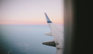 Preview wallpaper airplane wing, porthole, sky