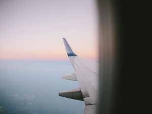 Preview wallpaper airplane wing, porthole, sky