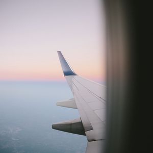 Preview wallpaper airplane wing, porthole, sky