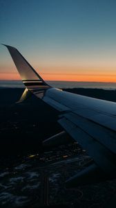 Preview wallpaper airplane, wing, sky, flight, night