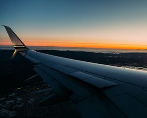 Preview wallpaper airplane, wing, sky, flight, night