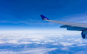 Preview wallpaper airplane wing, sky, flight, clouds, blue