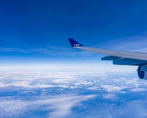 Preview wallpaper airplane wing, sky, flight, clouds, blue