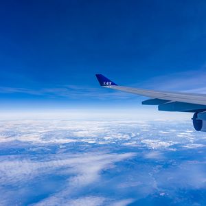 Preview wallpaper airplane wing, sky, flight, clouds, blue