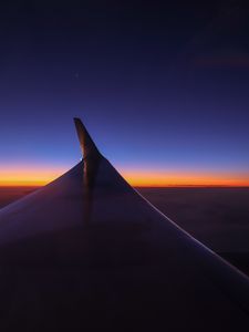 Preview wallpaper airplane wing, sky, flight, horizon, sunset