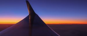 Preview wallpaper airplane wing, sky, flight, horizon, sunset