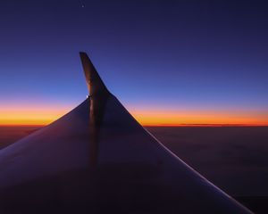 Preview wallpaper airplane wing, sky, flight, horizon, sunset