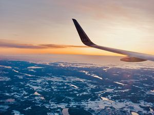 Preview wallpaper airplane, wing, view, land, overview