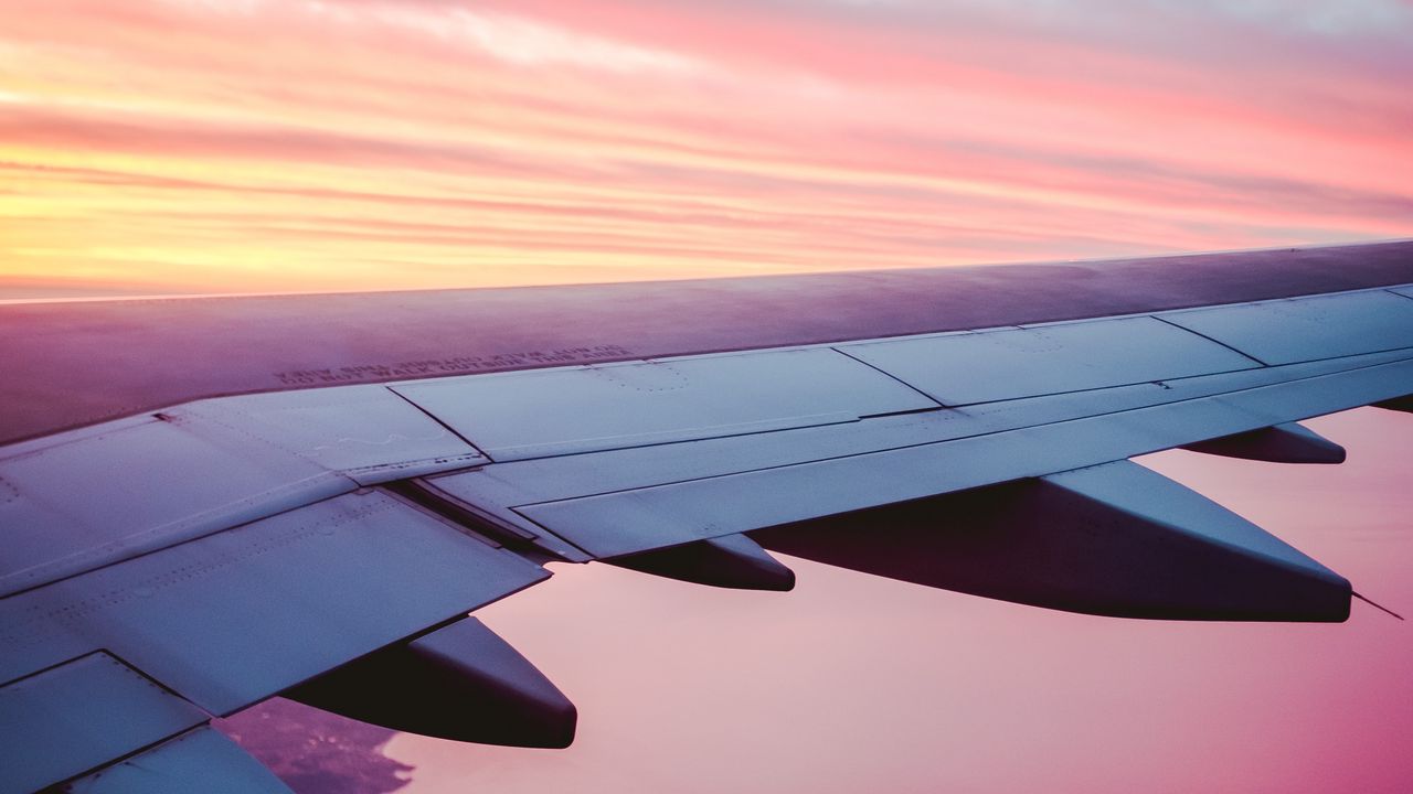 Wallpaper airplane, wing, view, sky, dusk