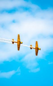 Preview wallpaper airplanes, airshow, trick, sky, smoke, aerobatics