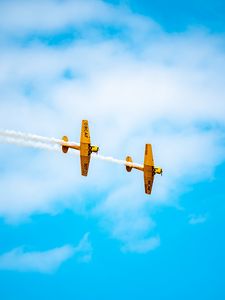 Preview wallpaper airplanes, airshow, trick, sky, smoke, aerobatics