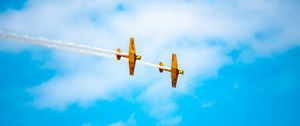 Preview wallpaper airplanes, airshow, trick, sky, smoke, aerobatics