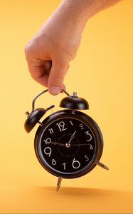 Preview wallpaper alarm clock, clock, time, hand, yellow