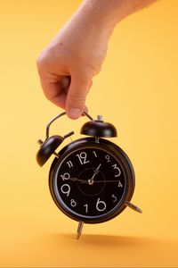 Preview wallpaper alarm clock, clock, time, hand, yellow