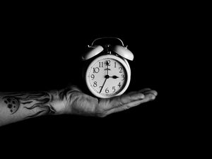 Preview wallpaper alarm clock, hand, bw, clock, time
