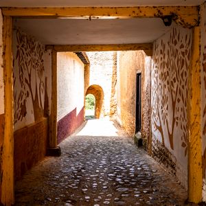 Preview wallpaper alley, arch, tunnel, stones, walls, fresco