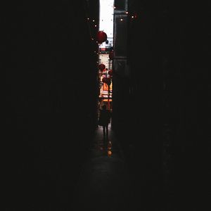 Preview wallpaper alleyway, dark, silhouette, garland, lanterns