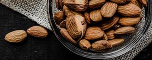 Preview wallpaper almonds, nuts, bowl, spoon
