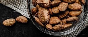 Preview wallpaper almonds, nuts, bowl, spoon